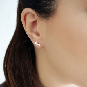 Urban Outfitters A Little Love handwritten script earrings, gold.